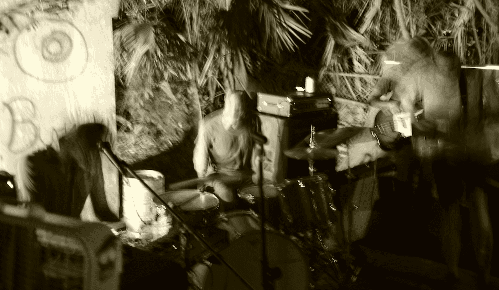 Tin Armor playing outdoors, very blurry
